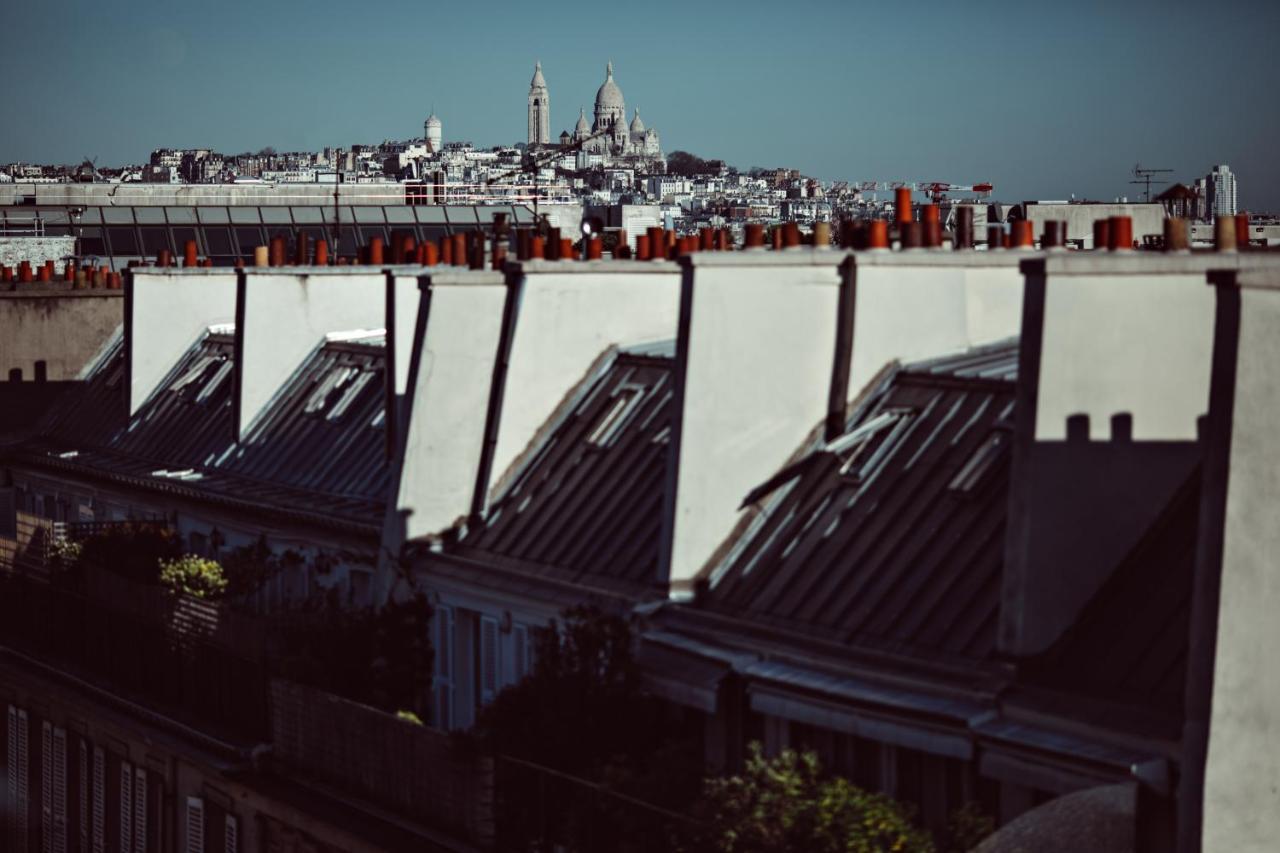 Monsieur George Hotel & Spa - Champs-Elysees Paris Ngoại thất bức ảnh View of the roofs of Paris
